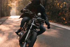 motorcycle rider with black helmet