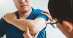 doctor studying elbow injury