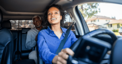 woman driving for uber with passenger