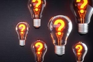 lightbulbs with lit up question marks