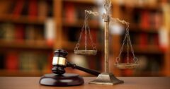 scales of justice on table