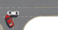 computerized image of a red car T-boning a white car in an intersection